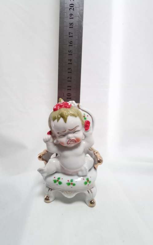 Most beautiful vintage brat! Crying baby on chair figurine