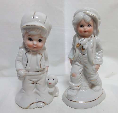 Two very cute vintage Capodimonte boy figurines