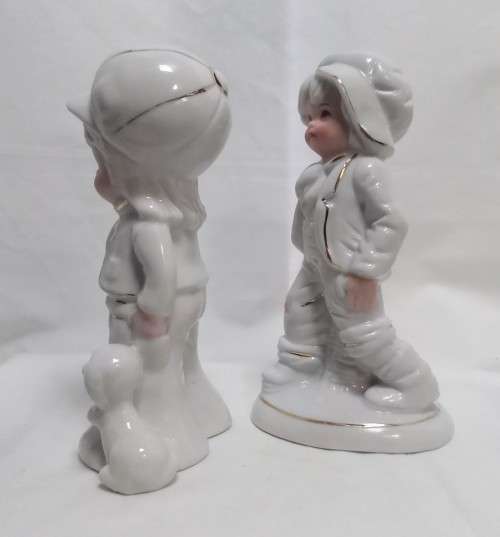 Two very cute vintage Capodimonte boy figurines