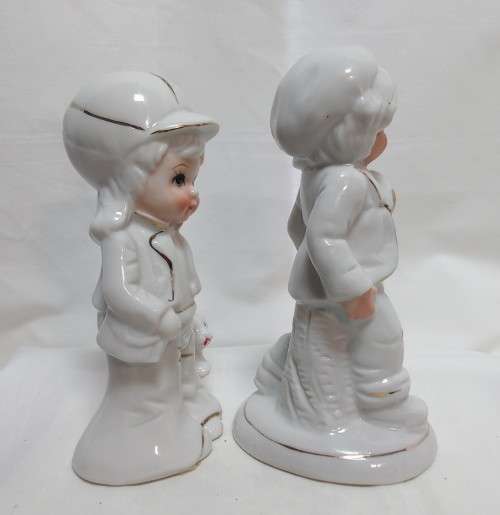 Two very cute vintage Capodimonte boy figurines