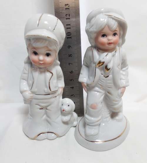 Two very cute vintage Capodimonte boy figurines