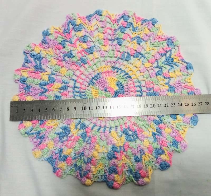 Vintage hand crocheted multi coloured doily