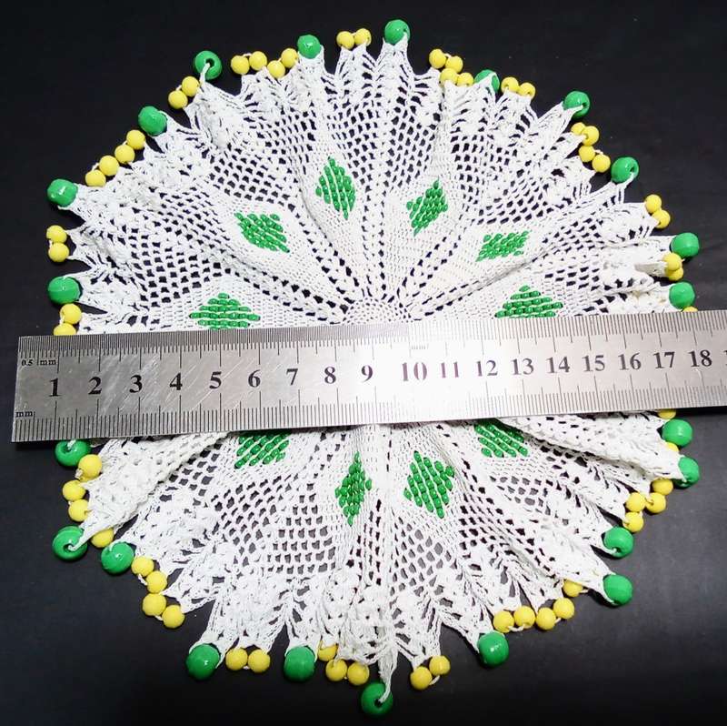Vintage hand crocheted jug cover/doily with green and yellow glass beads