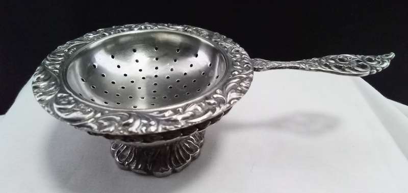 Vintage tea strainer with bowl
