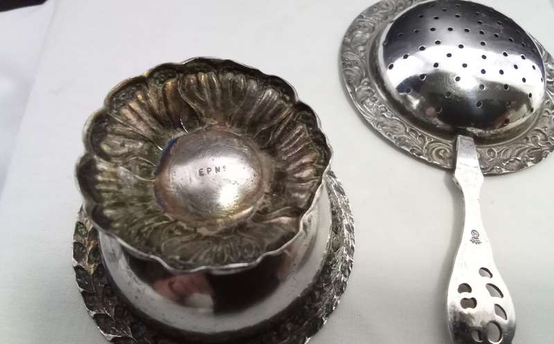 Vintage tea strainer with bowl