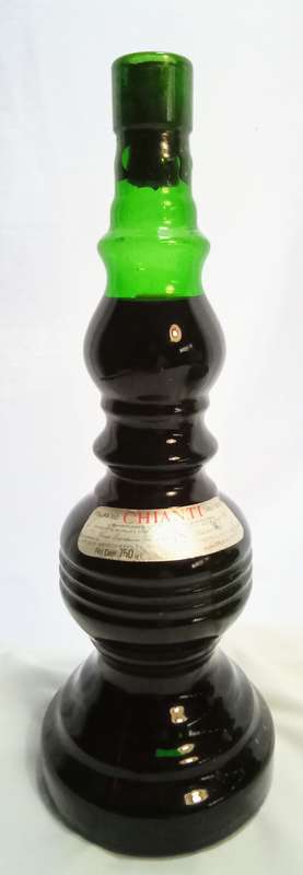 Beautiful vintage green glass Chianti wine bottle with glass shade