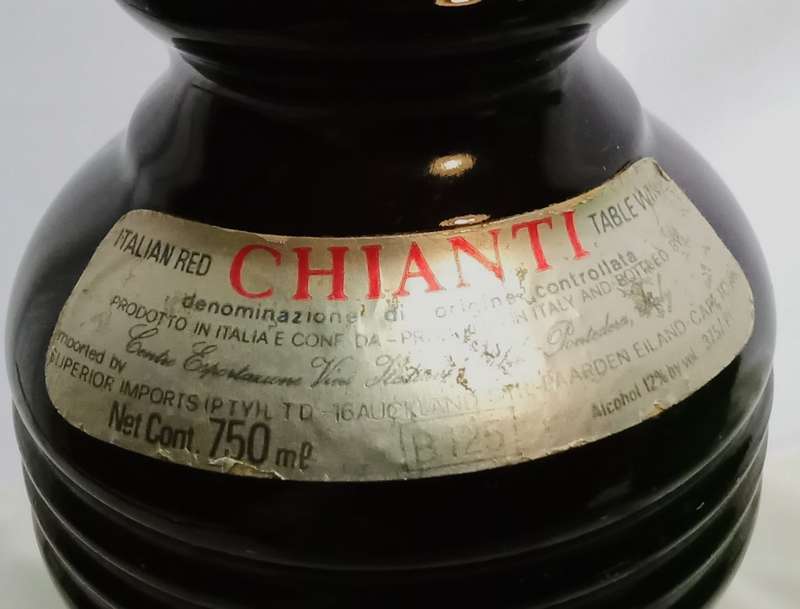 Beautiful vintage green glass Chianti wine bottle with glass shade