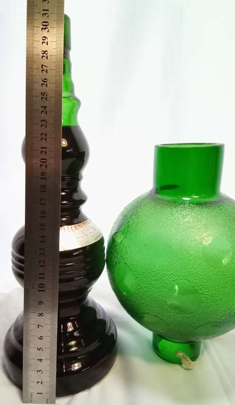 Beautiful vintage green glass Chianti wine bottle with glass shade