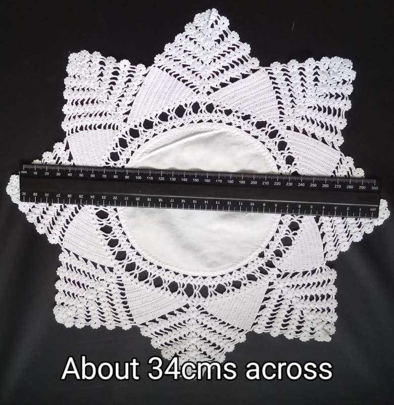 Beautiful Crocheted doily - about 34cms across