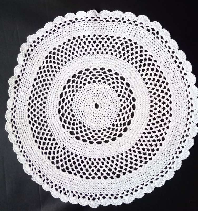 Beautiful Crocheted doily - about 19cms across