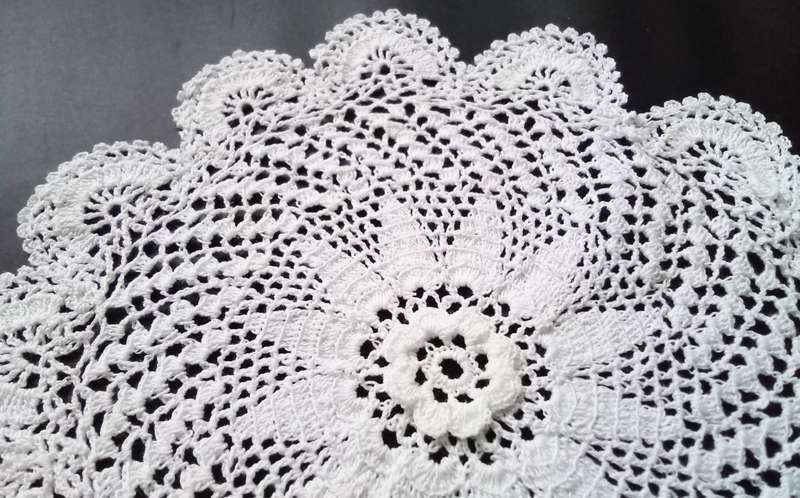 4 Beautiful Crocheted doiles - about 16cms across