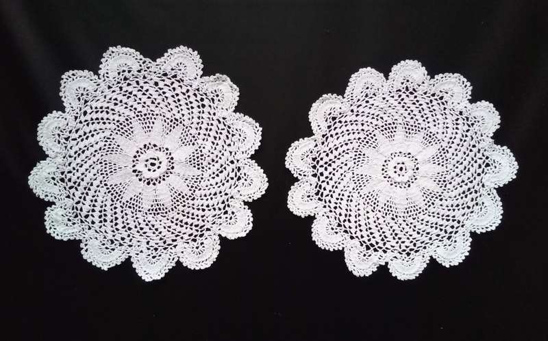 2 Beautiful Crocheted doilies - about 16cms across