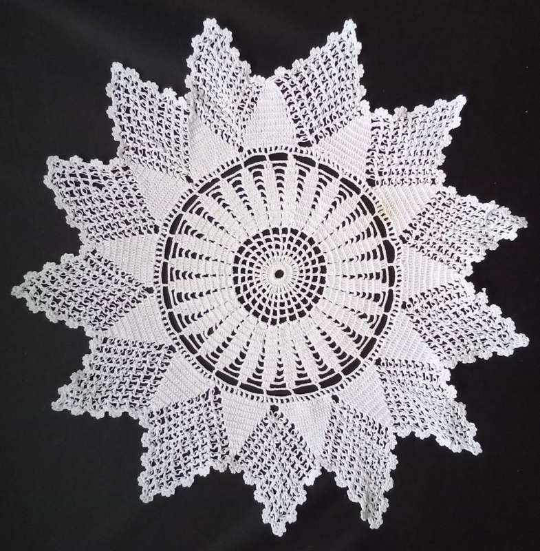Beautiful Crocheted doily - about 32cms across