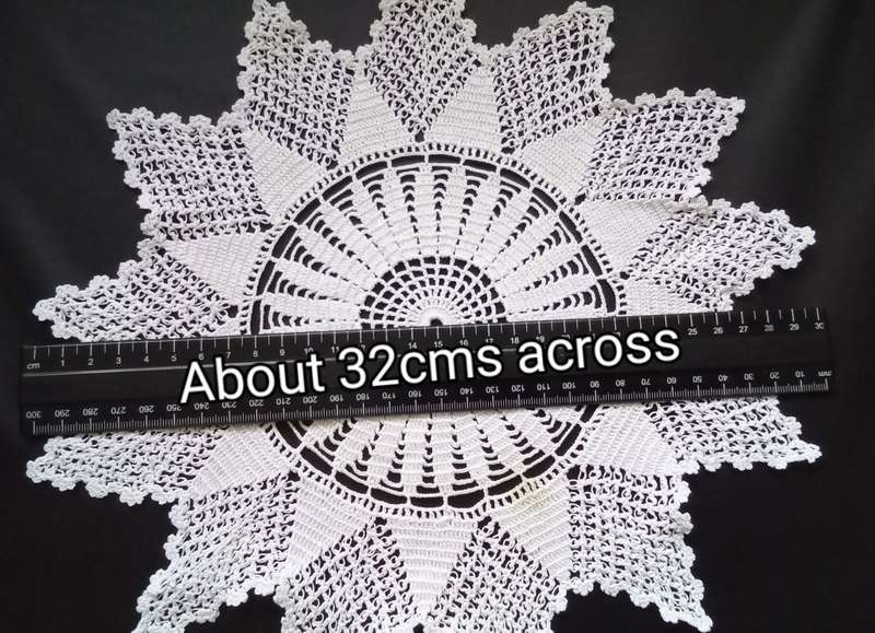 Beautiful Crocheted doily - about 32cms across