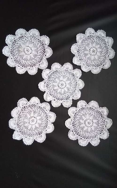 Five small Crocheted doilies - about 12cms across