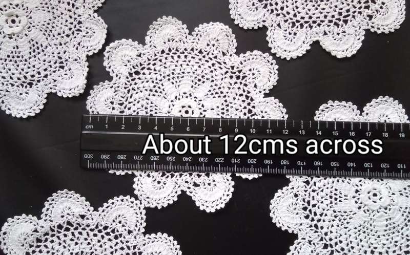 Five small Crocheted doilies - about 12cms across
