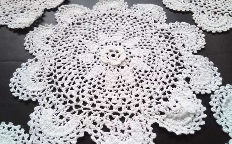 Five small Crocheted doilies - about 12cms across