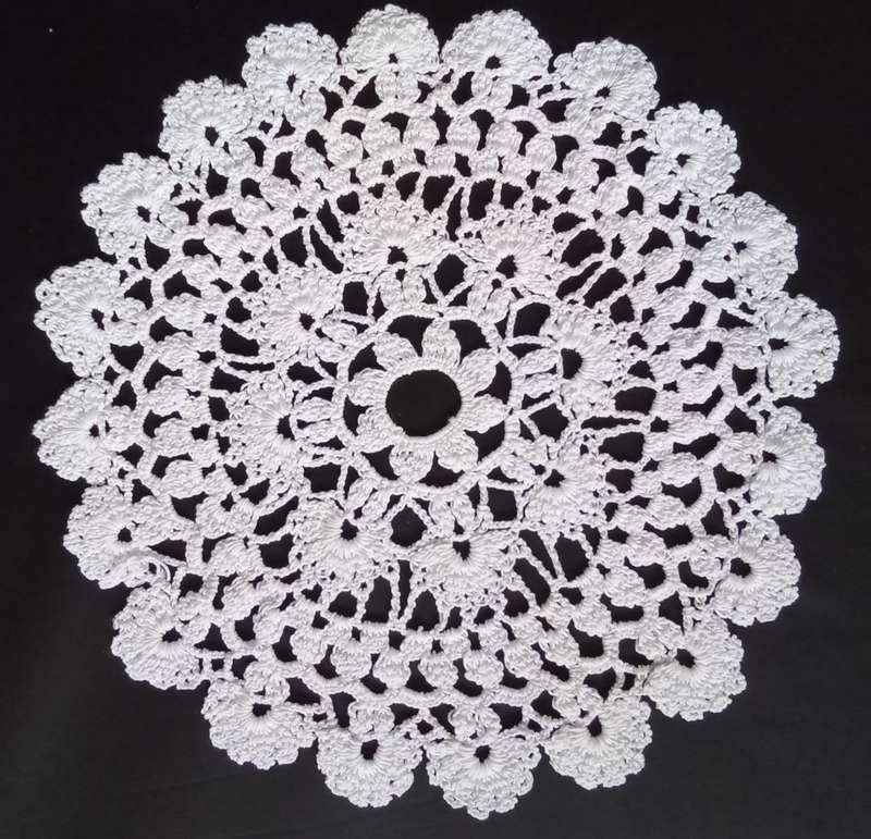 Pretty crocheted doily - about 20cms across