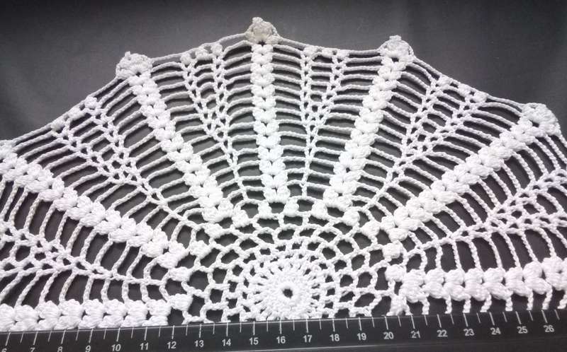 Pretty crocheted doily - about 32cms across