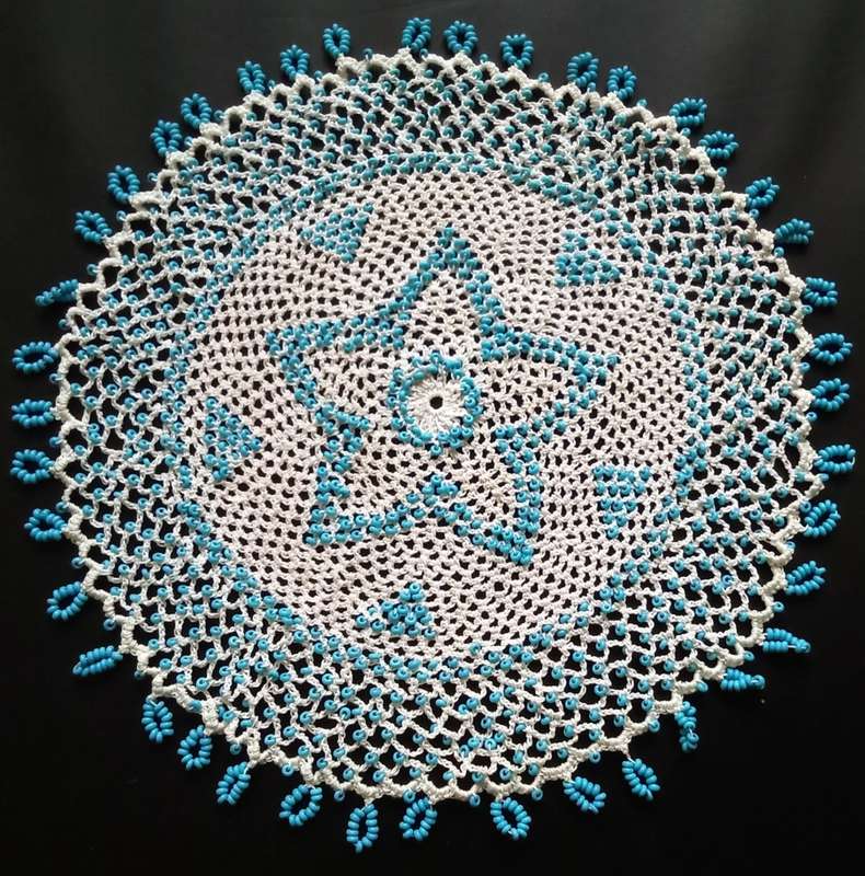 Beautiful beaded hand crocheted doily/jug cover - about 18cms across