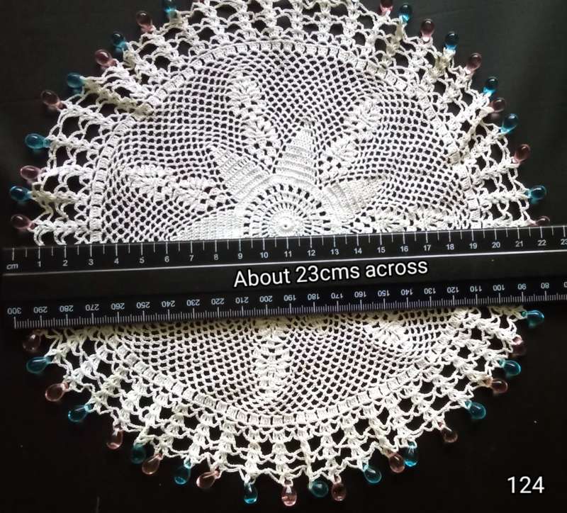Magnificent beaded hand crocheted doily/jug cover - about 23cms across