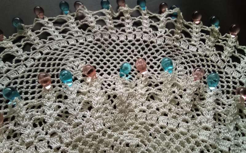 Magnificent beaded hand crocheted doily/jug cover - about 23cms across