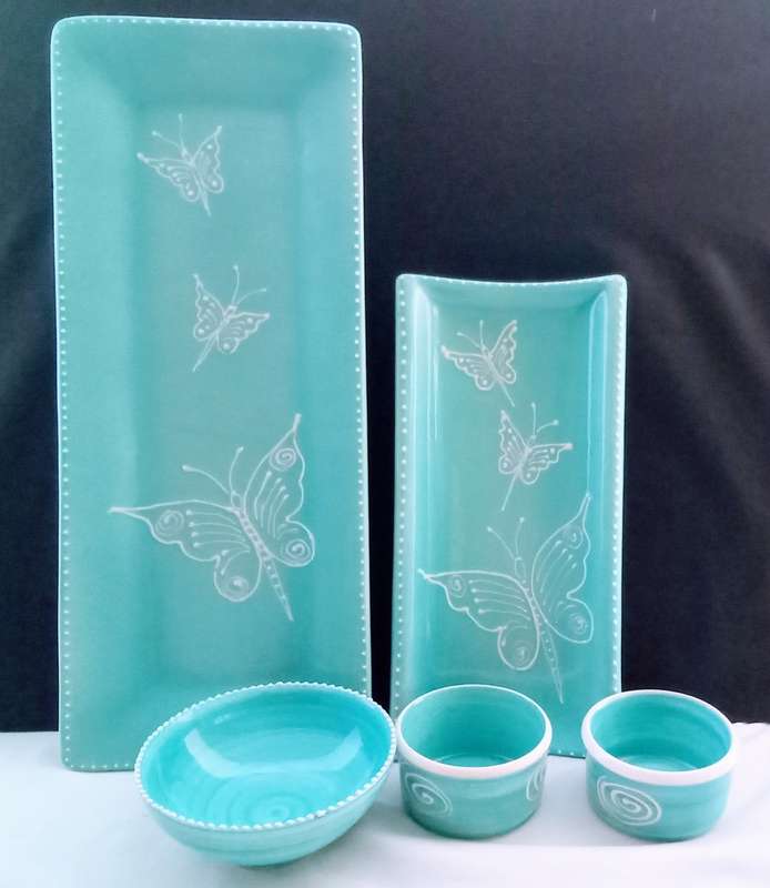 Very pretty hand made turquoise ceramic serving set
