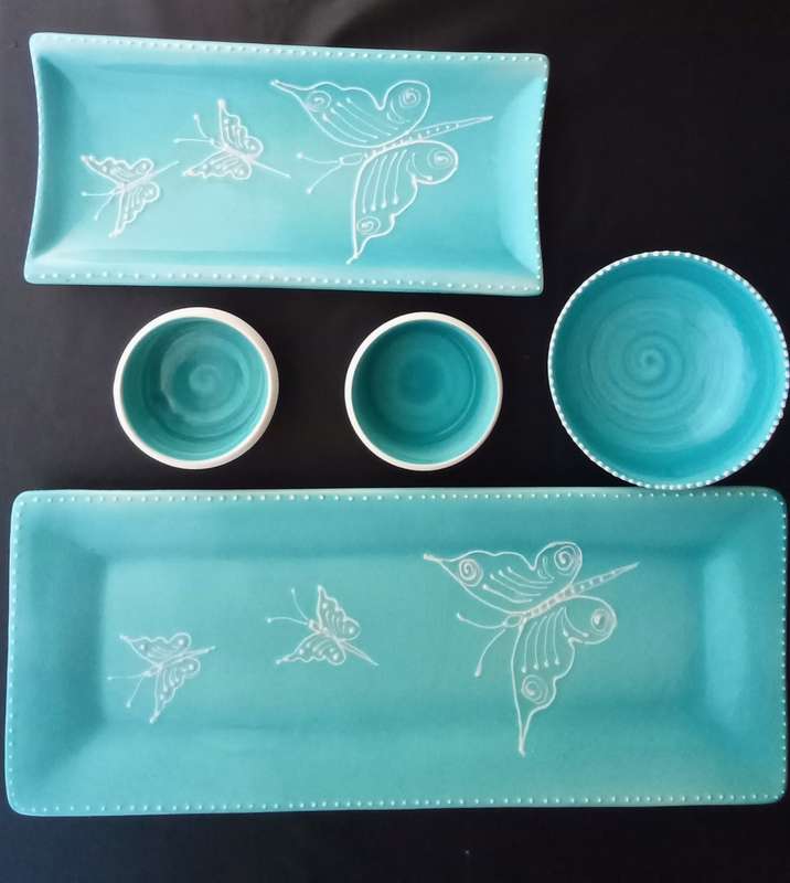 Very pretty hand made turquoise ceramic serving set