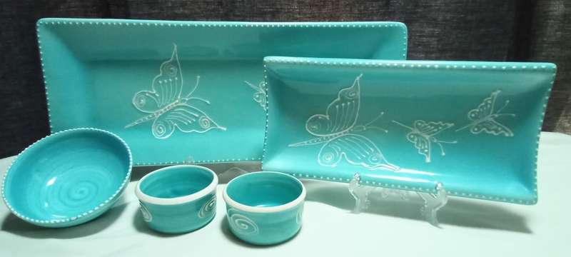 Very pretty hand made turquoise ceramic serving set