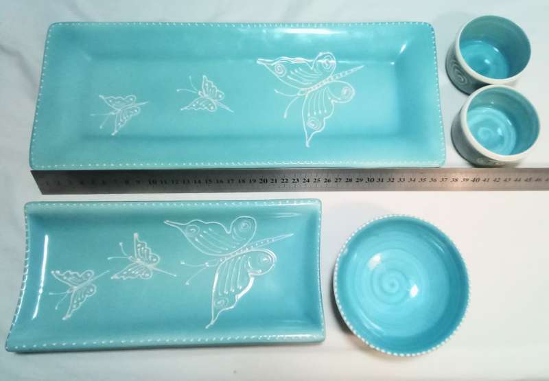 Very pretty hand made turquoise ceramic serving set