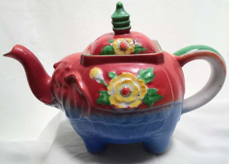 Very old funky elephant teapot in vivid colours