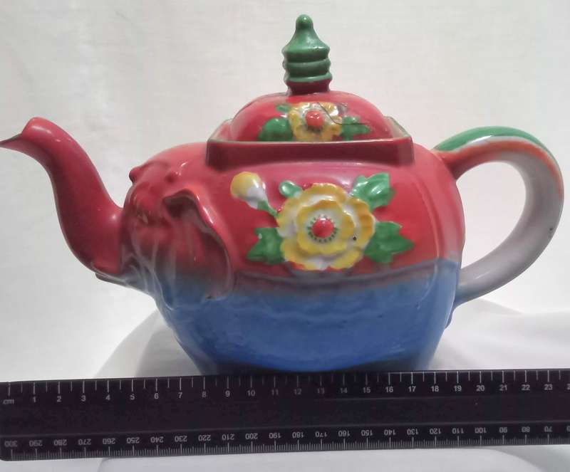 Very old funky elephant teapot in vivid colours
