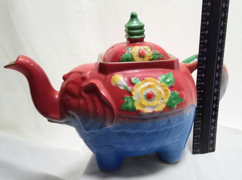 Very old funky elephant teapot in vivid colours