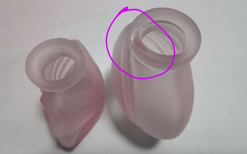 Two Vintage frosted pink perfume bottles