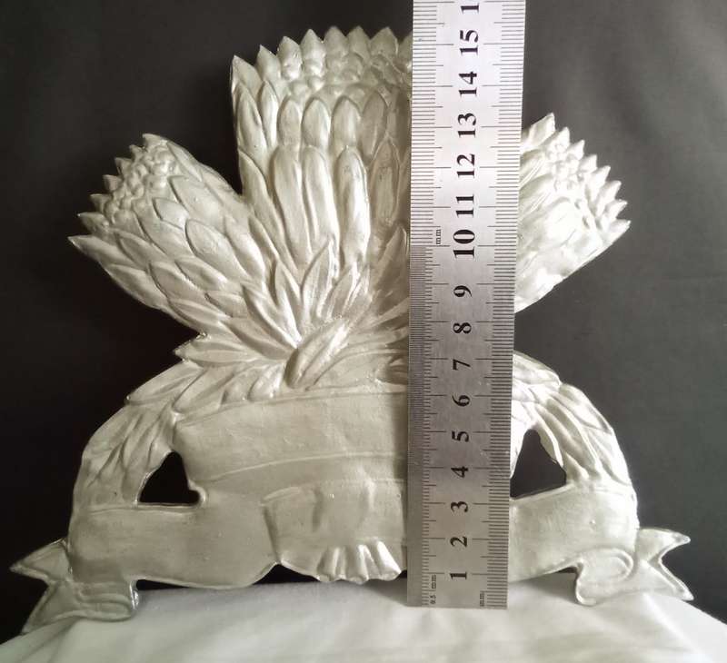 Moulded metal protea plaque