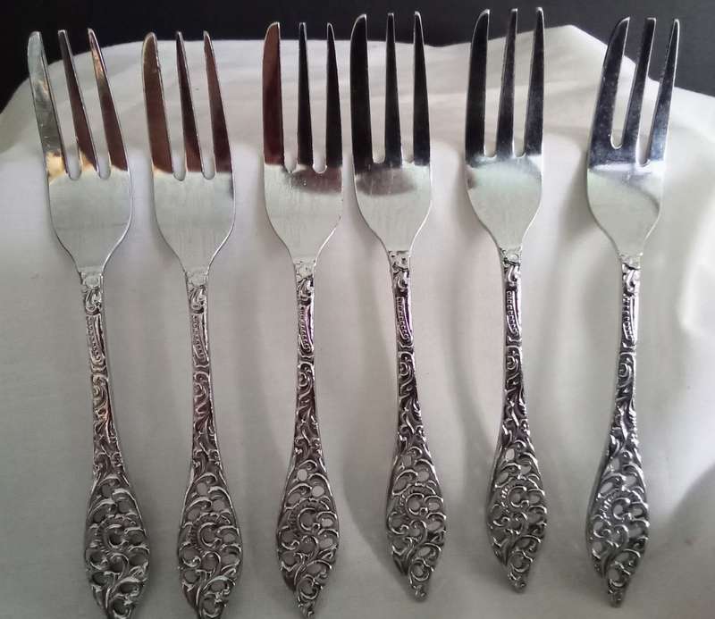 Six vintage chrome plated cake forks