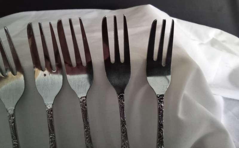 Six vintage chrome plated cake forks