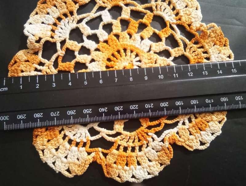 Lovely vintage hand crocheted small orange doily