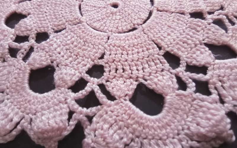 Lovely pink hand crocheted vintage doily