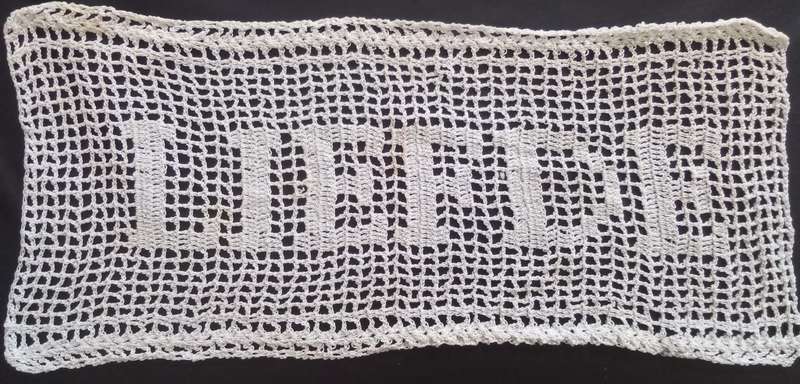 Notably unique white hand crocheted vintage doily