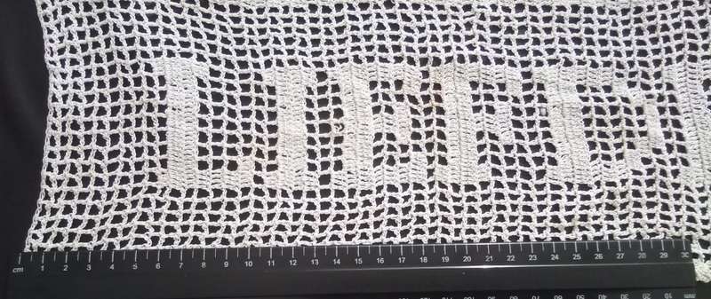 Notably unique white hand crocheted vintage doily