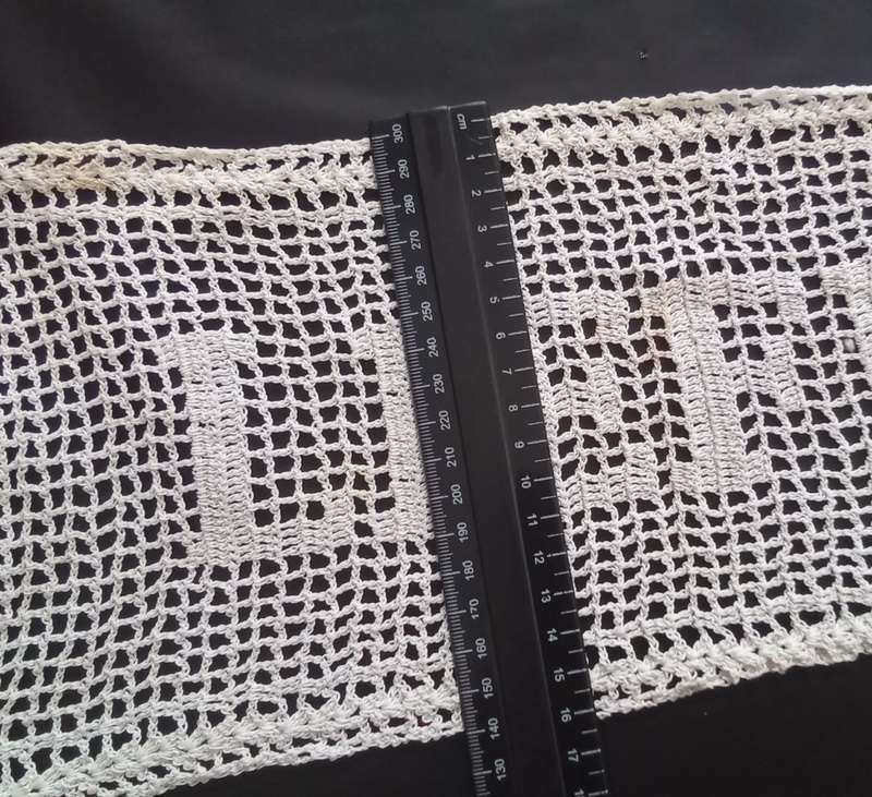 Notably unique white hand crocheted vintage doily