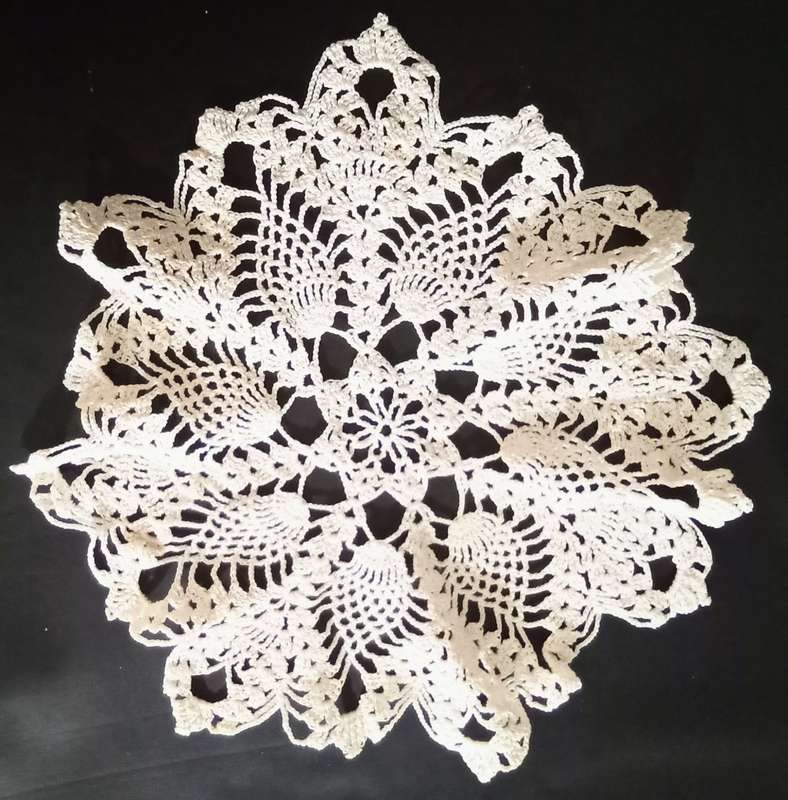 Very pretty white hand crocheted vintage doily