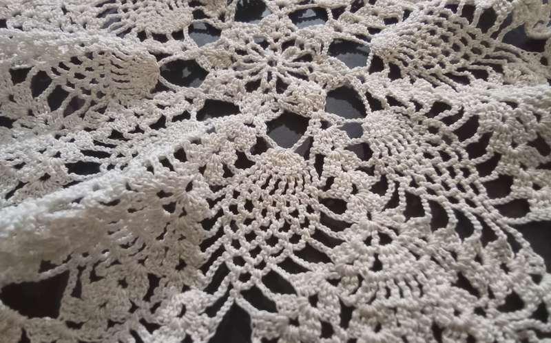 Very pretty white hand crocheted vintage doily
