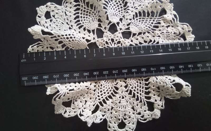 Very pretty white hand crocheted vintage doily