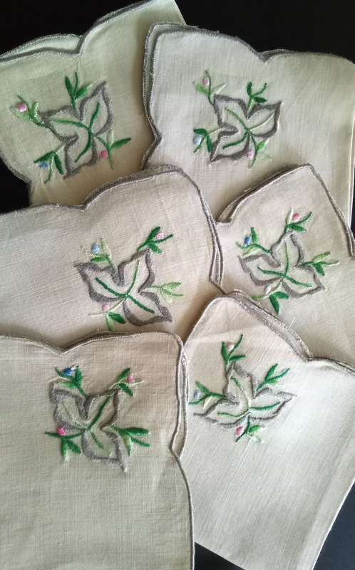 Six stunning vintage embroidered serviettes