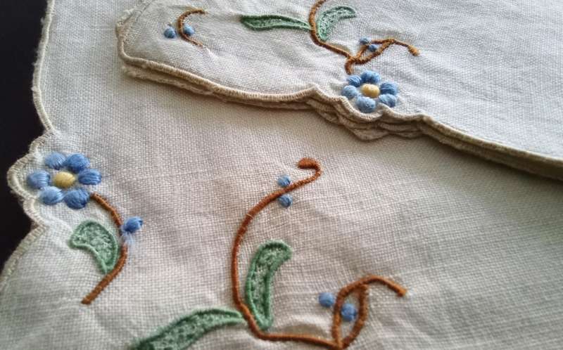 Two stunning vintage embroidered serviettes