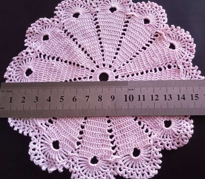 Beautiful vintage crocheted pink doily