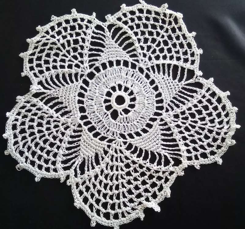 Lovely crocheted white doily