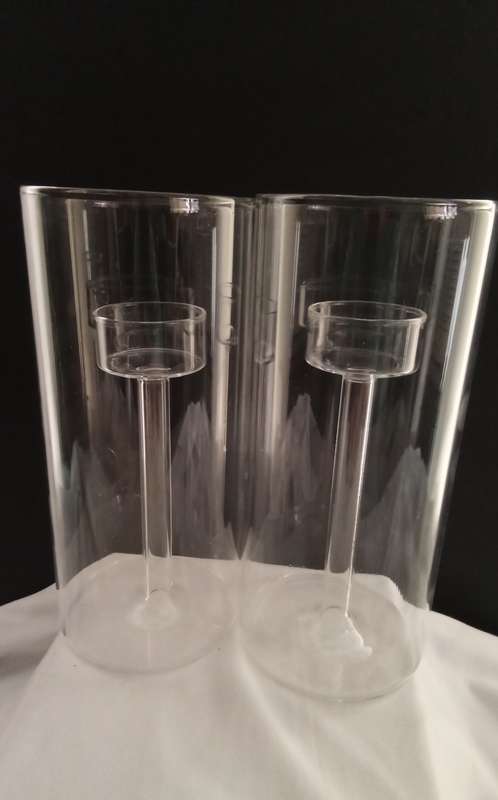 Two glass candle holders